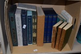 A small collection of Folio Society volumes with titles such as English Eccentrics and Brief Lives