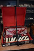 A vintage Bell accordion, with hard case