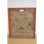 A Victorian needlework alphabet sampler, stitched by Jane Reed, framed and under glass, measuring
