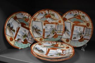 Six 19th/20th Century Japanese Kutani dishes, decorated with geisha and heightened in gilding,