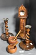 A late 19th Century inlaid pokerwork pocket watch stand, in the form of a longcase clock,