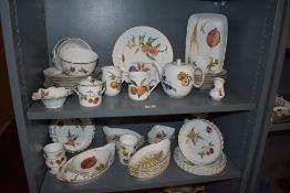 An assorted collection of Royal Worcester Evesham patterned tableware, including flan dishes,