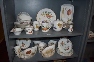 An assorted collection of Royal Worcester Evesham patterned tableware, including flan dishes,