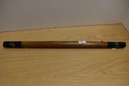 A Victorian night stick marked VR with no.18 on the handle.