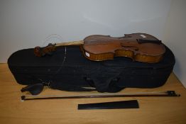 A traditional violin, labelled John G Murdoch, London - The Maidstone, with bow but no case
