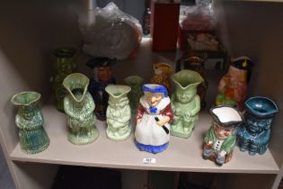 A collection of thirteen pottery 'Toby' jugs, various to include Burlington, Avon Ware, and a silver