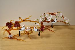 Two attractive 20th Century art glass arrangements of birds on branches, the largest measures 28cm