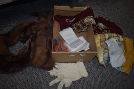 A vintage mink stole and a selection of scarves, gloves and hankies.