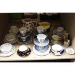 A mixed assortment of vintage tea cups, saucers including Tuscan China 'Manhattan', sold along