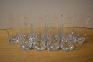 A group of ten mid-20th Century dimpled glass tumblers, the largest measure 15cm tall