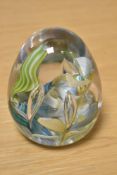 A Ray Annenberg for Whitefriars glass, Paperweight, having blue, green and yellow Millefiori swirl.