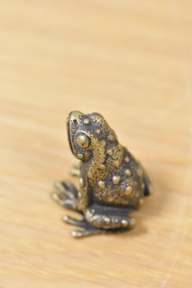 A brass frog, having 'A' impressed to underside. - Image 3 of 3