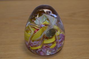 A Whitefriars paperweight by Ray Annenberg in Millefiori yellow, pink and white swirls, Catalogue N