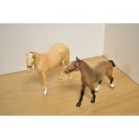 A Royal Doulton horse study Palomino, designed by Shane Ridge, slight colour variation to the