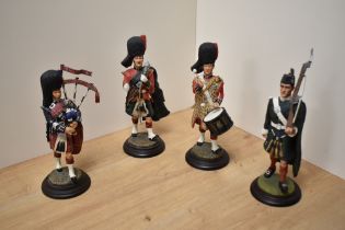 A group of four Ballantynes of Walkerburn cast-resin military figures, comprising Black Watch Drum