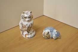 A Royal Crown Derby bone china 'Fifi' Persian cat form paperweight decorated in grey and gilt with