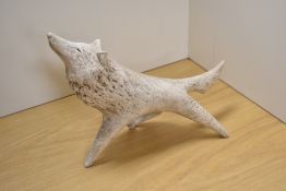A limited edition Paul Smith ceramic sculpture of a stretching wolf, signed, numbered 1/20 and dated