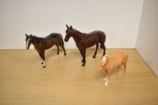 A group of three Beswick Pottery horse studies, comprising Palomino H259 designed by Shane Ridge