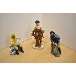 A group of three Royal Doulton maritime themed bone china figures, comprising The Helmsman HN2499,