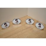 A group of four Royal Doulton bone china 'The 14th International Royal Doulton & Beswick