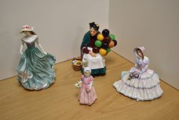 A group of four Royal Doulton bone china figurines, comprising Tinkle Bell HN1677, Daydreams HN1731,