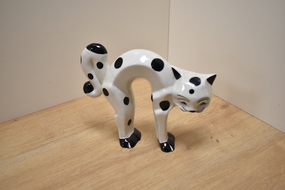 A Lorna Bailey hand-painted limited edition pottery stylised cat figure, modelled with arched back