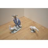 A Lladro porcelain figure group Hurry Now 5503 together with goose figure Hissing