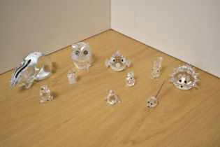 A small selection of Swarovski crystal ornaments, to include owl, fish hedgehog and various birds,