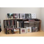 A large selection of compact discs as per photos with good resale potential - rock , pop , indie and