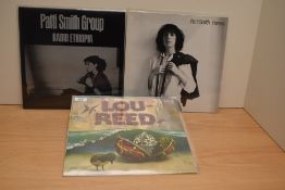 A lot of albums by Lou Reed and Patti Smith