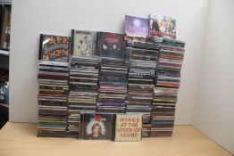 A large selection of compact discs as per photos with good resale potential - rock , pop , indie and