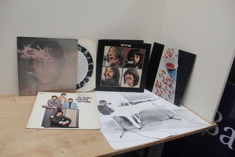A lot of four original Beatles album - viewing is recommended