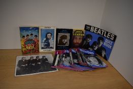A small Beatles lot with photos , monthlies , books and more - includes ' in his own write ' the