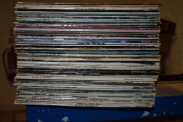 A lot of approximately 60 albums that we recommend you view - some possible resale potential