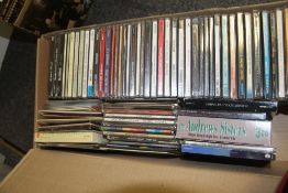 A large box of compact discs with promos and more - good resale lot -100 approximately