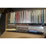 A large box of compact discs with promos and more - good resale lot -100 approximately