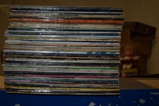 A lot of approximately 60 albums that we recommend you view - some possible resale potential