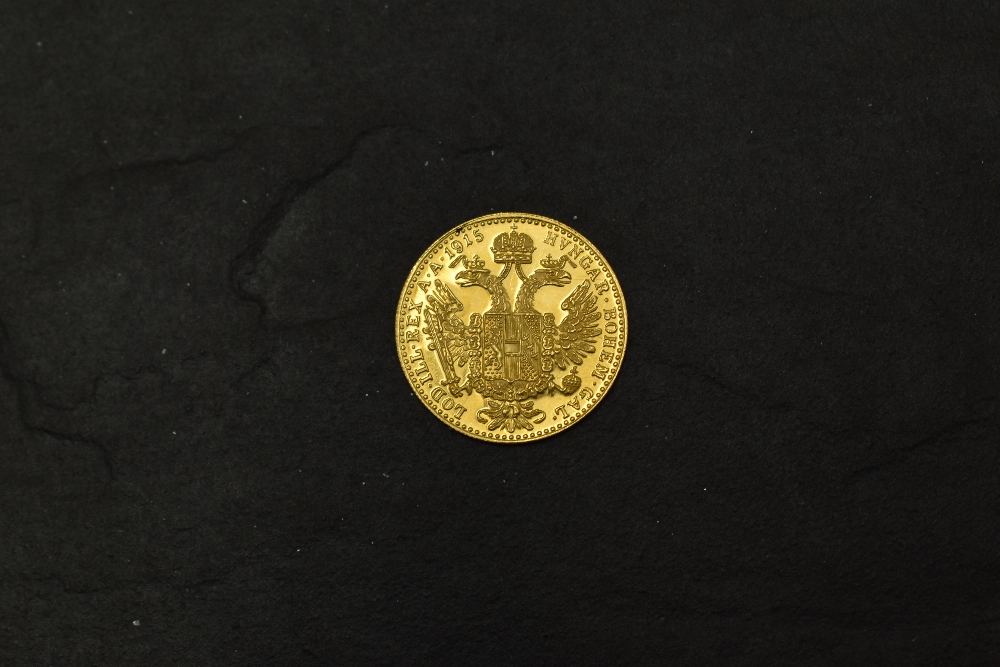 An Austrian 1915 Gold One Ducat Coin, restike, possible proofs, weight 3.5g