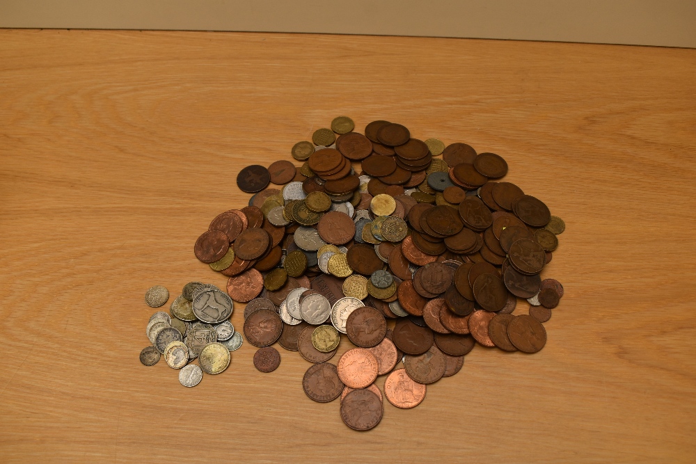 A collection of GB and World Coins including 1.9oz of World Silver, Half Penny, Penny, Farthings,