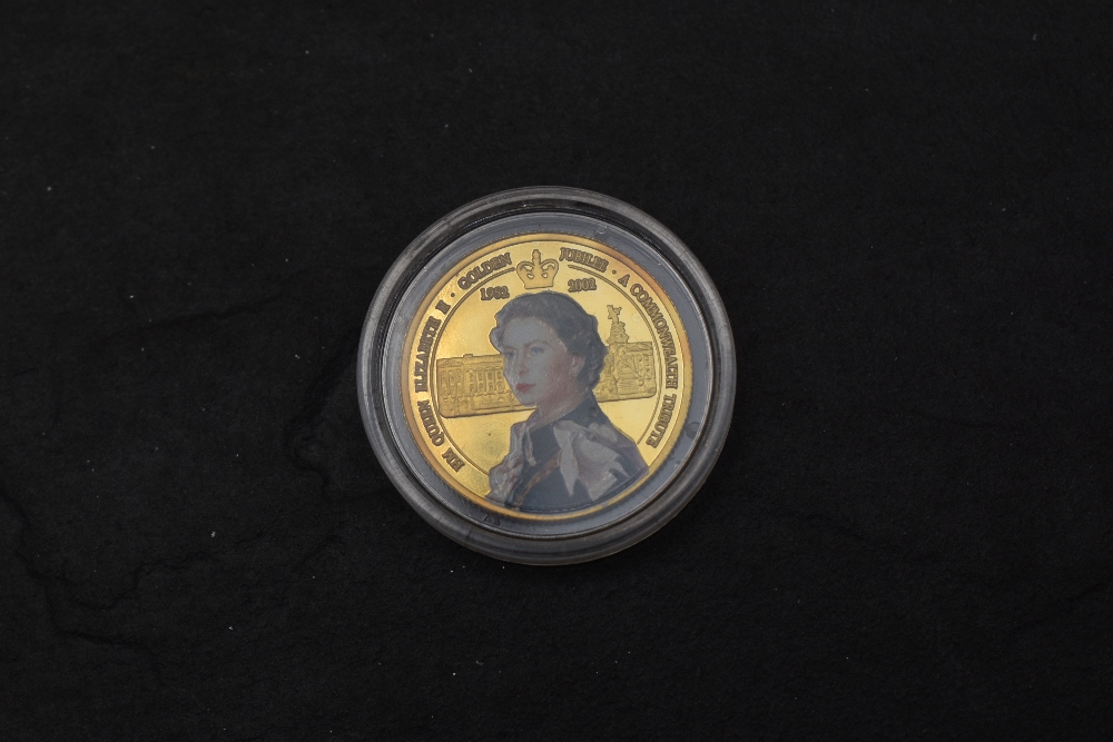 A 2002 Bank of Ghana 500 Sika Gold Coin, commemorating the Golden Jubilee of Queen Elizabeth II,