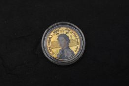 A 2002 Bank of Ghana 500 Sika Gold Coin, commemorating the Golden Jubilee of Queen Elizabeth II,