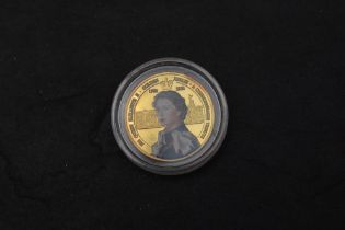 A 2002 Bank of Ghana 500 Sika Gold Coin, commemorating the Golden Jubilee of Queen Elizabeth II,