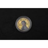 A 2002 Bank of Ghana 500 Sika Gold Coin, commemorating the Golden Jubilee of Queen Elizabeth II,