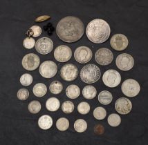 A collection of GB & World Silver Coins including James I 1603 Sixpence, GB 1820 Crown, 1820 Half