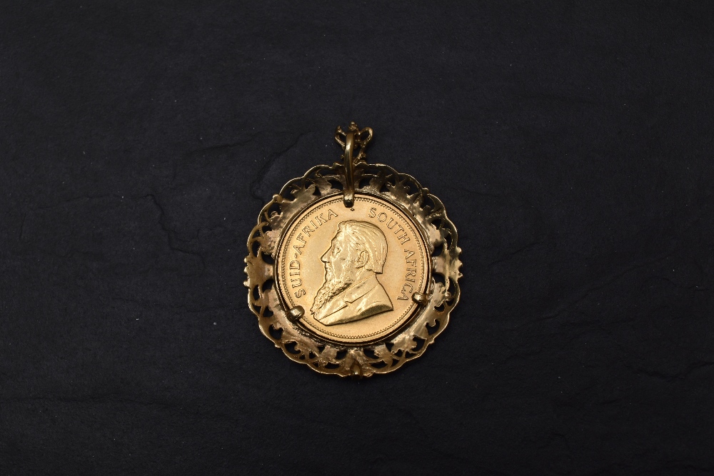 A 1978 South Africa 1oz Fine Gold Krugerrand in 9ct Gold pendant mount, total weight 45.3g - Image 2 of 2