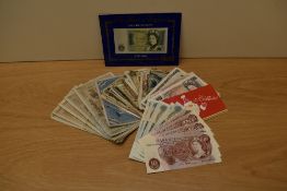 A collection of GB & World Banknotes, mint & used including 100 Pound in mint & used GB banknotes