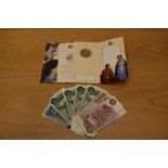 A Royal Mint Golden Wedding 1997 Five Pounds in folding wallet and slip case, Ten Shillings x2,