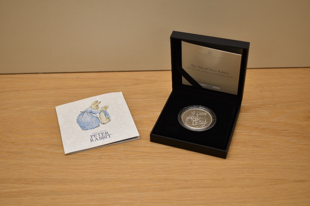 A Royal Mint 1oz Two Pound Silver Proof Coin, The Tale of Peter Rabbit 2021 UK, in display case with