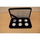 A Royal Mint 2007 Britannia 20th Anniversary, Silver Proof One Pound Collection with certificates in