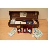 A collection of GB & World Coins including four Canadian Silver Dollars, three cased,1.5 oz of World